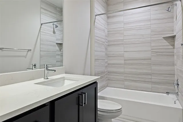 a view of a hallway with washer and dryer