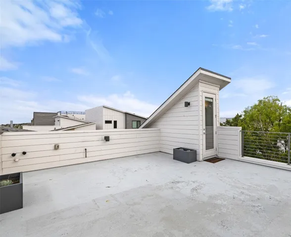 a view of a patio with a yard