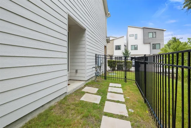 a view of a backyard with sitting area