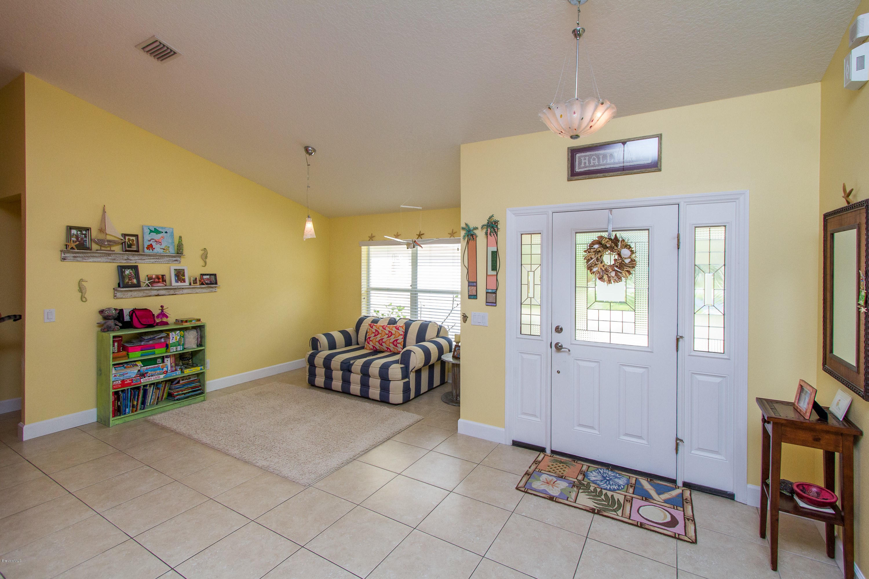 4135 Rayburn Road Cocoa, FL 32926 - Photo 4 of 25 004_Foyer