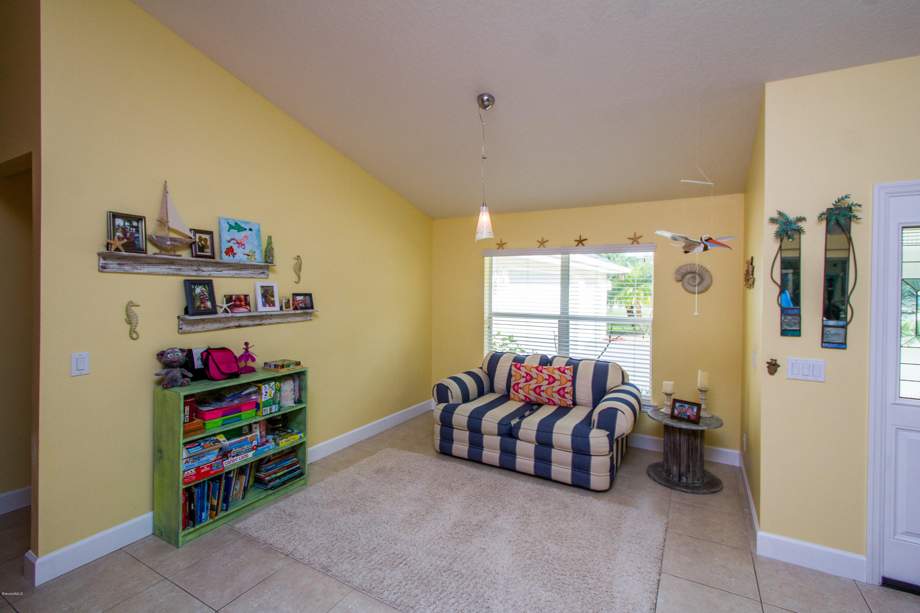 4135 Rayburn Road Cocoa, FL 32926 - Photo 5 of 25 005_Den