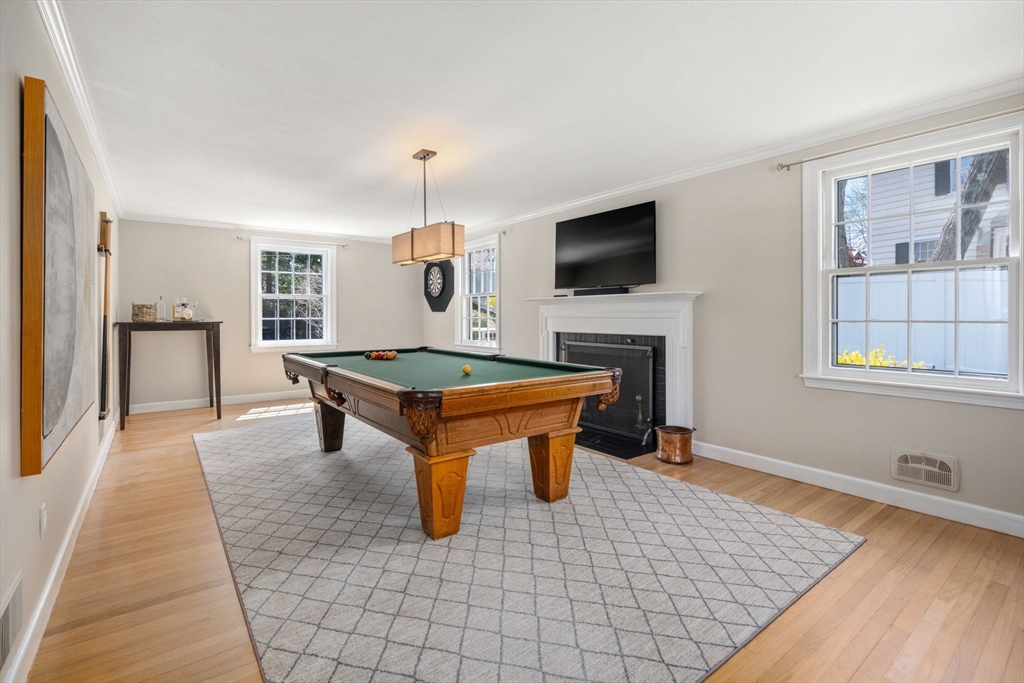30 Ivy Road Wellesley, MA 02482 - Photo 11 of 34 a living room with furniture and a flat screen tv