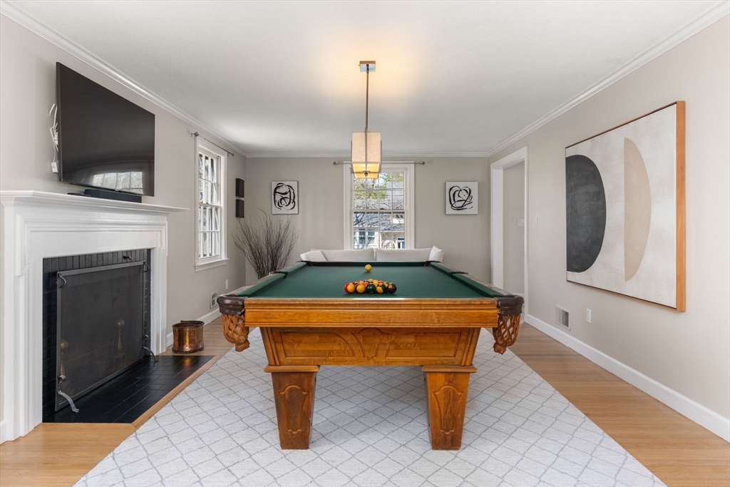 30 Ivy Road Wellesley, MA 02482 - Photo 12 of 34 a room with pool table flat screen tv and windows