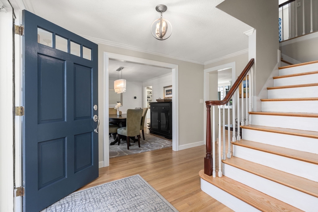 30 Ivy Road Wellesley, MA 02482 - Photo 16 of 34 a view of entryway and hall with wooden floor