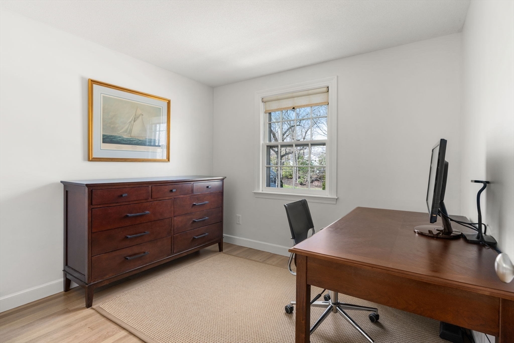 30 Ivy Road Wellesley, MA 02482 - Photo 24 of 34 a view of a workspace with furniture and a window