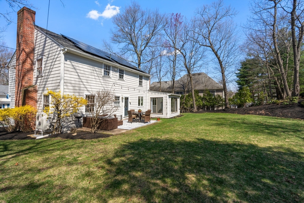 30 Ivy Road Wellesley, MA 02482 - Photo 31 of 34 a view of a house with backyard