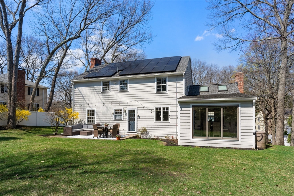 30 Ivy Road Wellesley, MA 02482 - Photo 33 of 34 a front view of a house with a garden