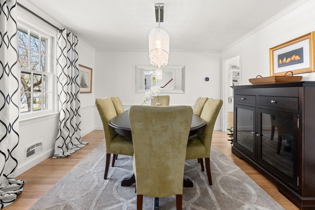 30 Ivy Road Wellesley, MA 02482 - Photo 10 of 34 a view of a dining room with furniture and chandelier