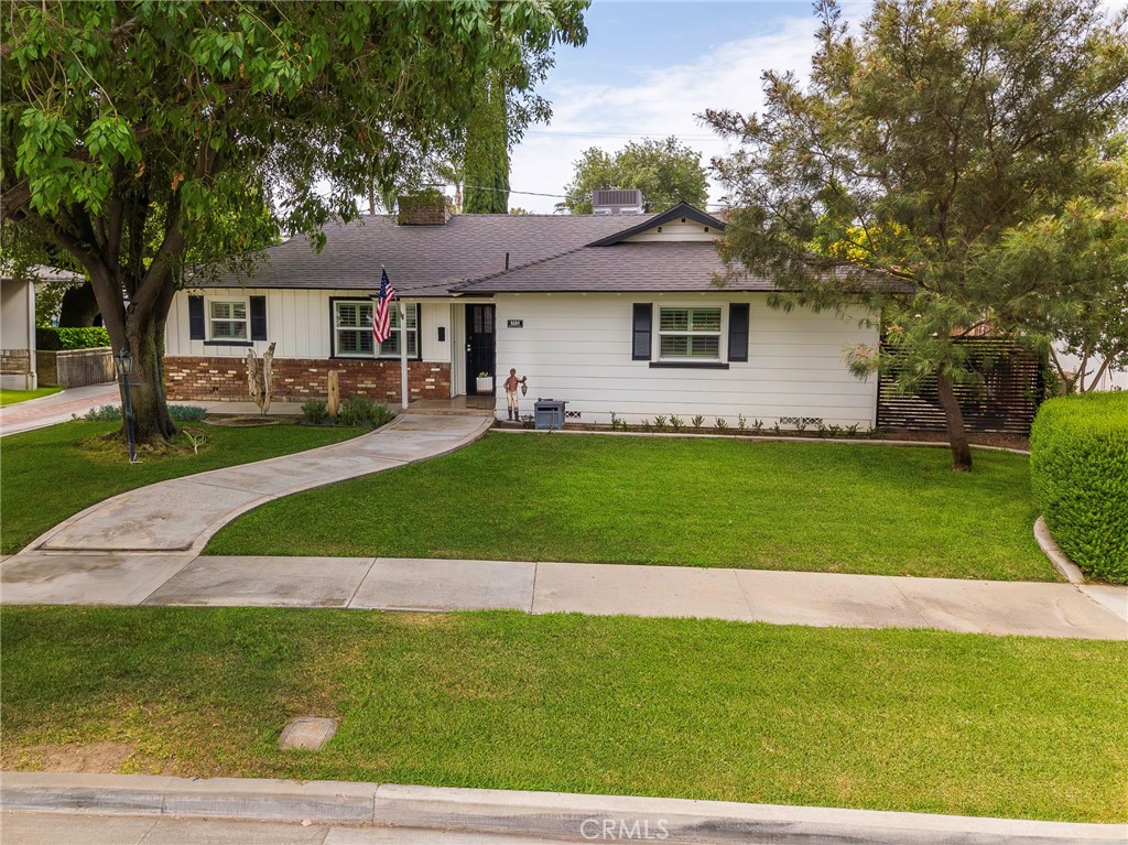 4684 Brentwood Avenue Riverside, CA 92506 - Photo 1 of 1 a front view of a house with a yard