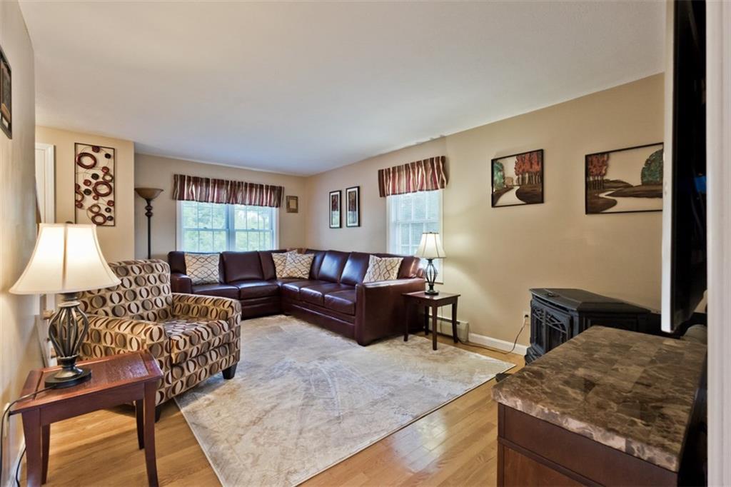 18 Ryan Road Saco, ME 04072 - Photo 14 of 35 Living room has pellet stove -...