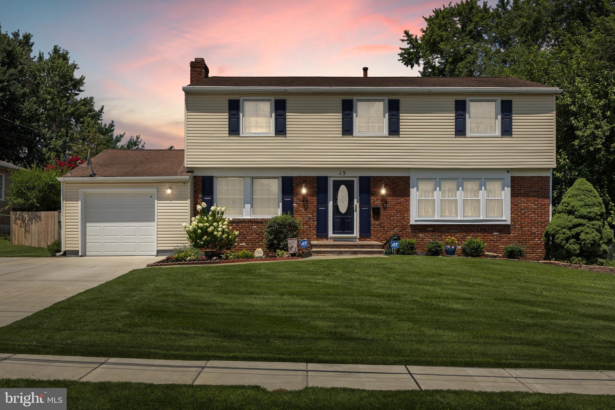 13 Rutgers Drive Delran, NJ 08075 - Photo 1 of 38 a front view of a house with a yard