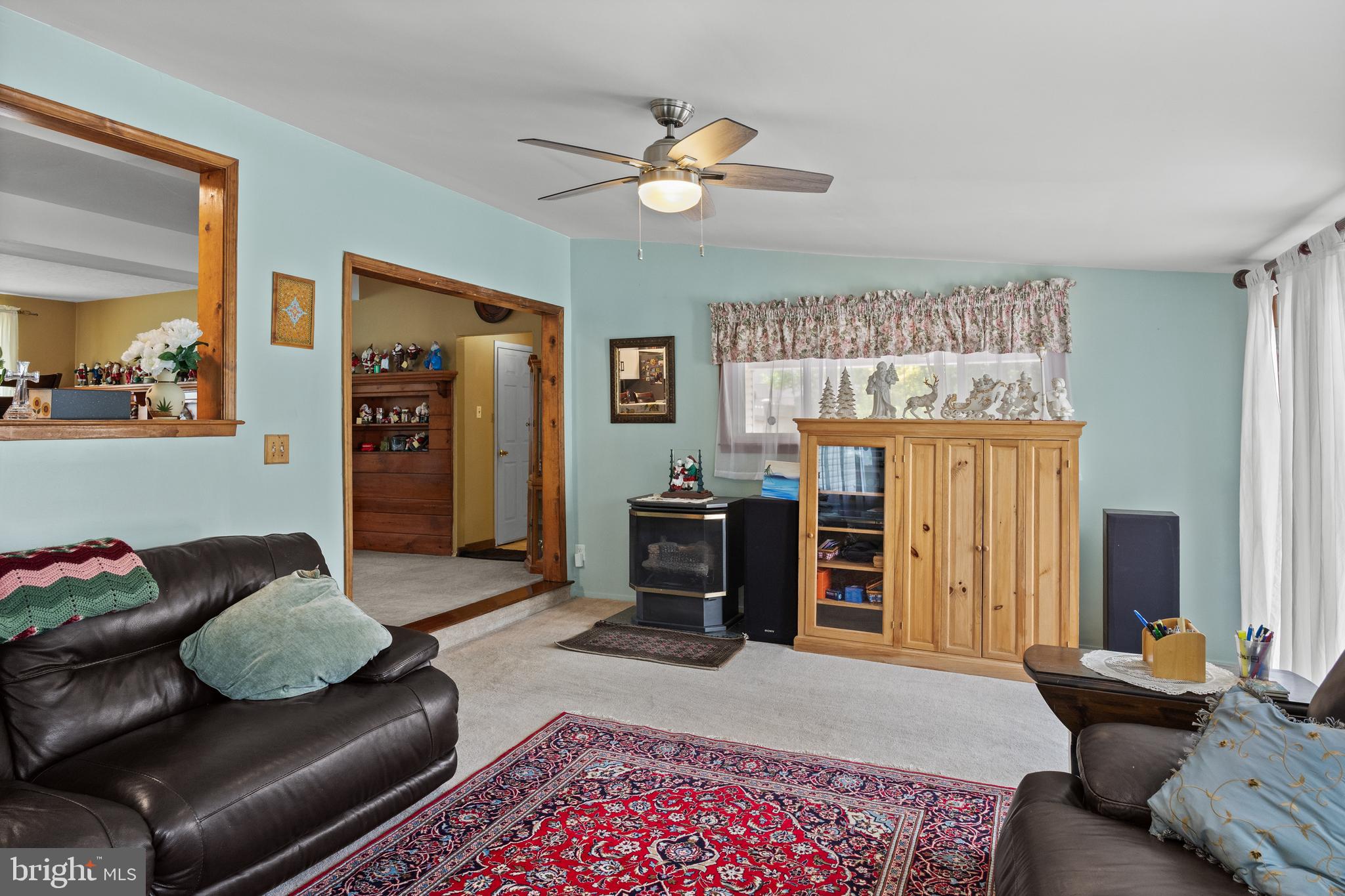 13 Rutgers Drive Delran, NJ 08075 - Photo 13 of 38 a living room with furniture and a flat screen tv