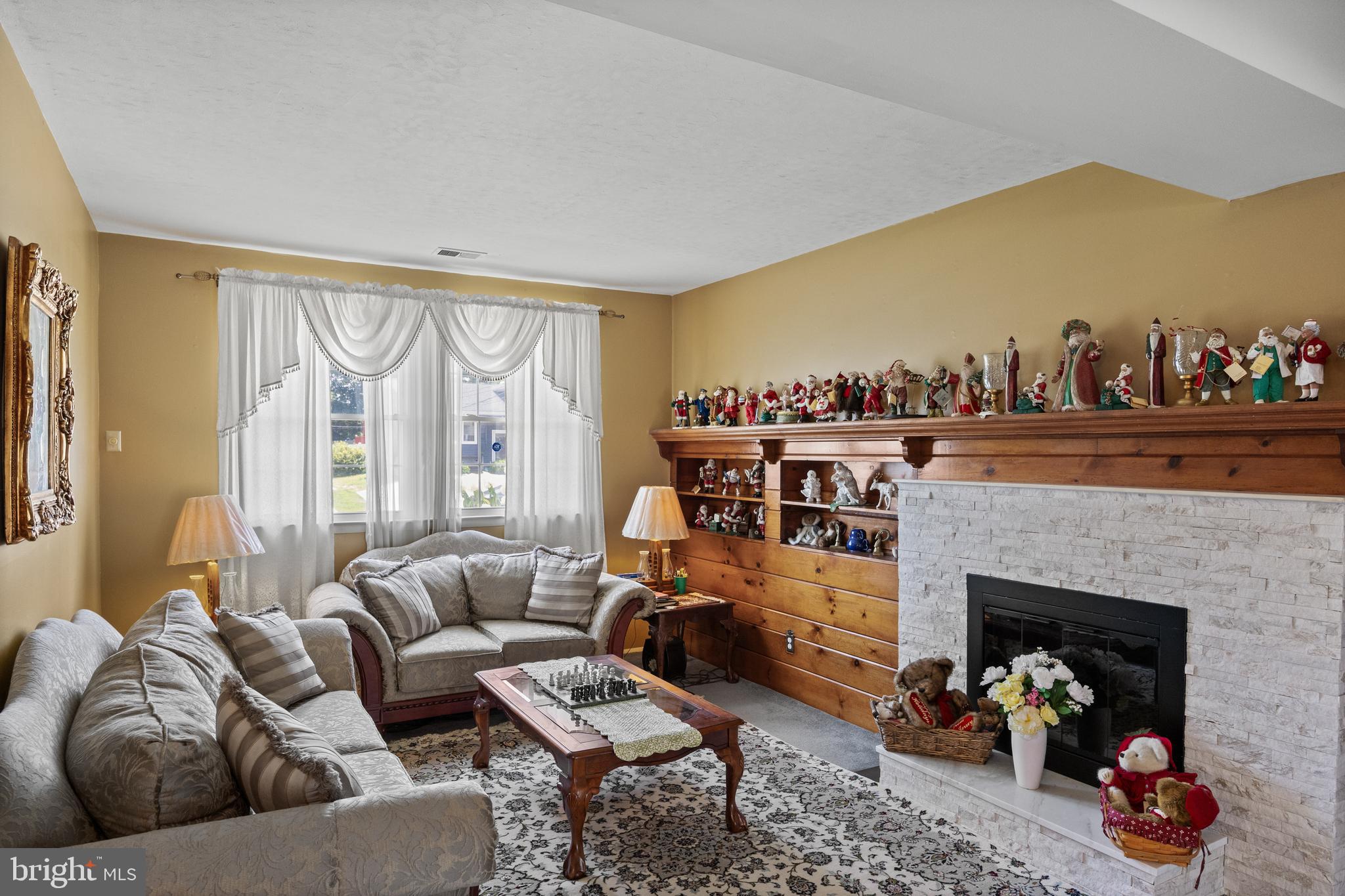 13 Rutgers Drive Delran, NJ 08075 - Photo 14 of 38 a living room with furniture and a fireplace