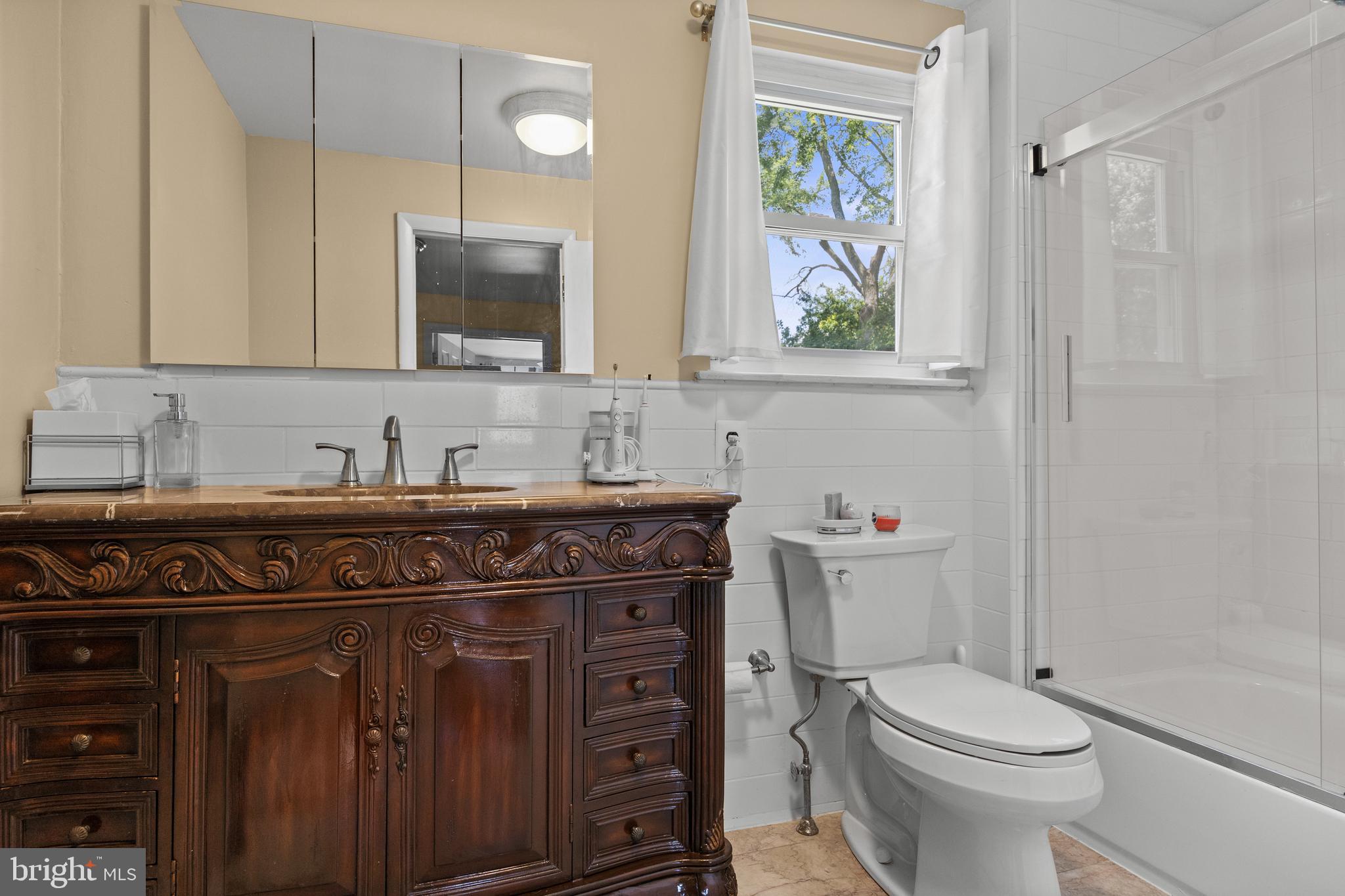 13 Rutgers Drive Delran, NJ 08075 - Photo 23 of 38 a bathroom with a granite countertop toilet sink and mirror