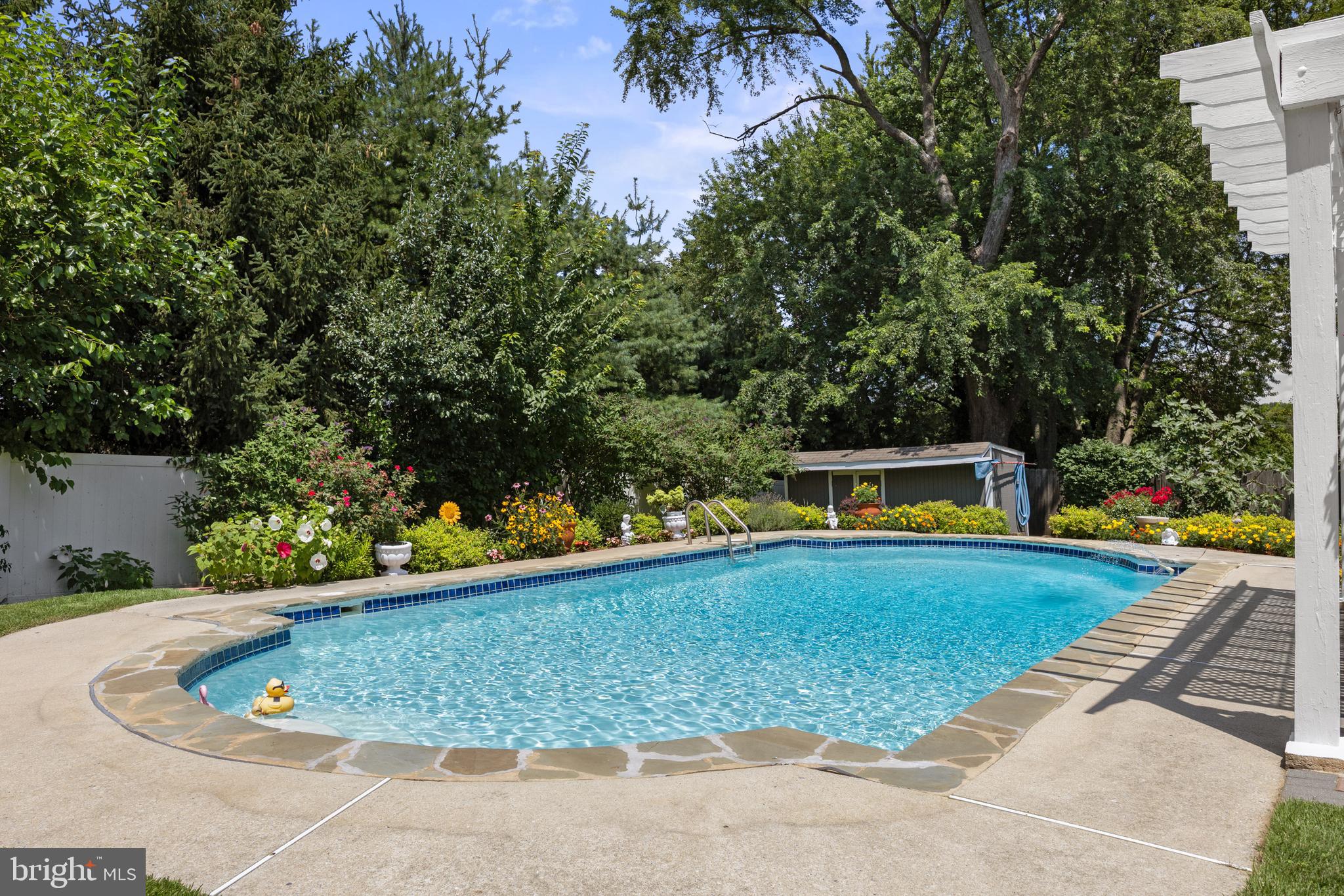 13 Rutgers Drive Delran, NJ 08075 - Photo 31 of 38 a view of a swimming pool with a yard