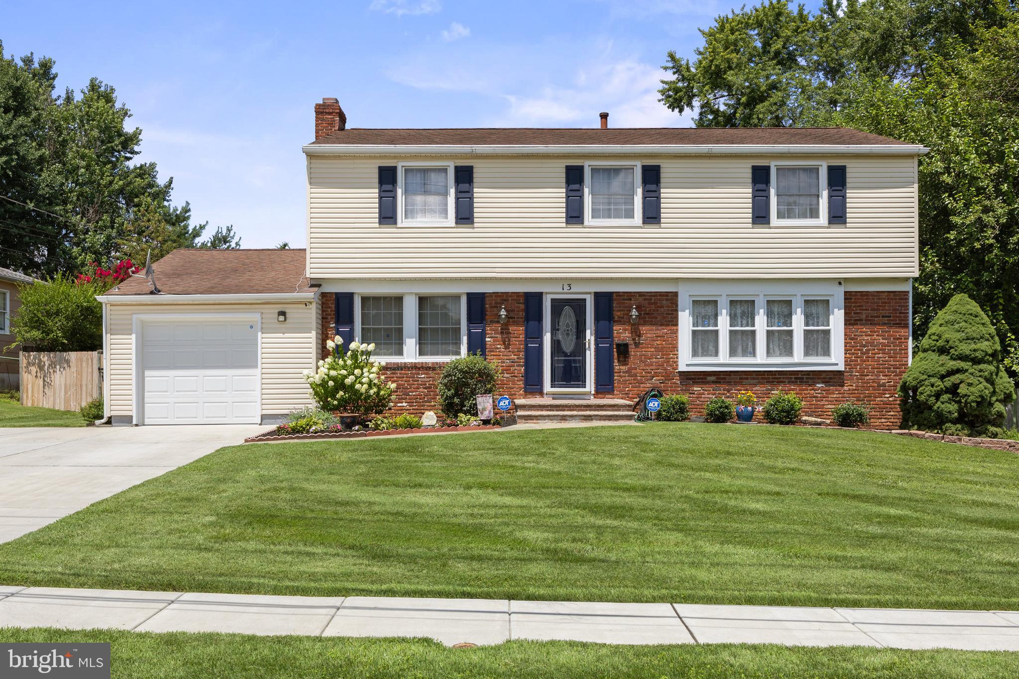 13 Rutgers Drive Delran, NJ 08075 - Photo 38 of 38 a front view of a house with a yard