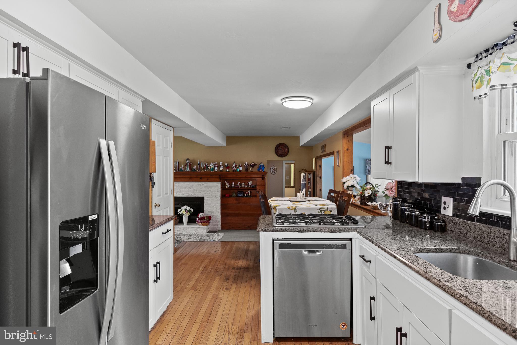 13 Rutgers Drive Delran, NJ 08075 - Photo 8 of 38 a kitchen with a refrigerator and a sink