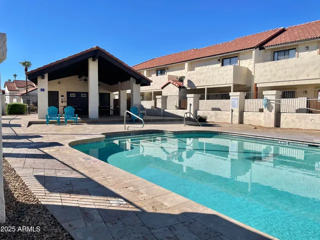 a view of a house with a swimming pool