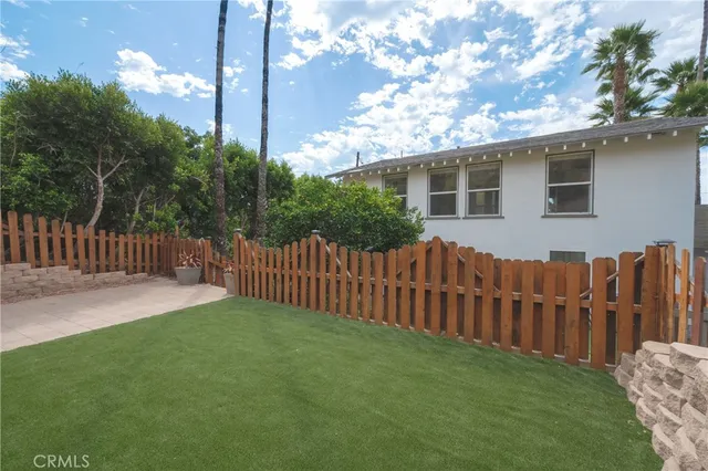 a front view of a house having yard