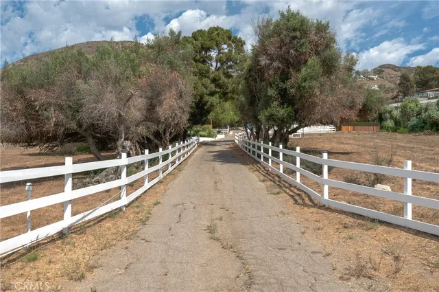 a view of a balcony with an outdoor space
