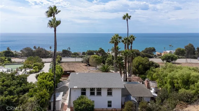 a view of a house with a ocean view