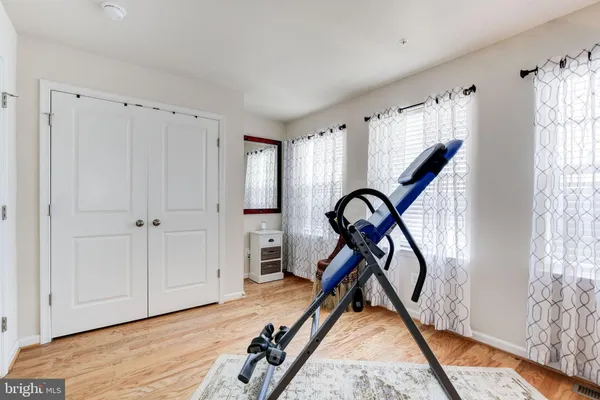 a view of a livingroom with furniture and a window