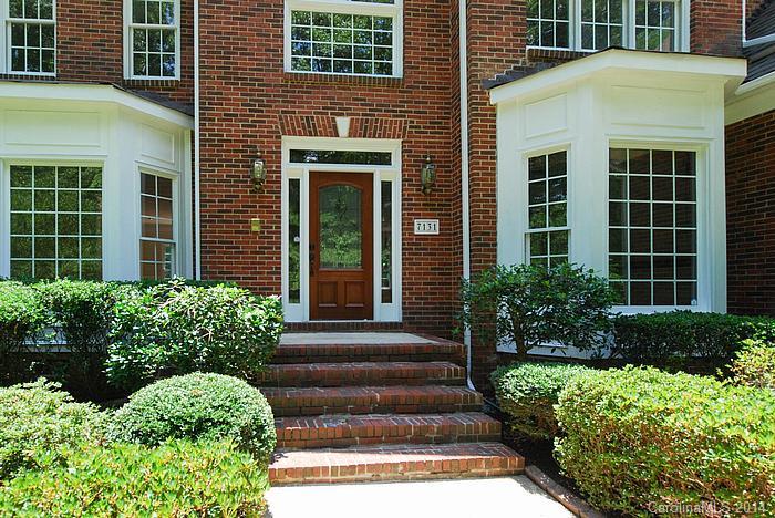 7131 Forest Ridge Road Weddington, NC 28104 - Photo 2 of 23 a view of a house with potted plants