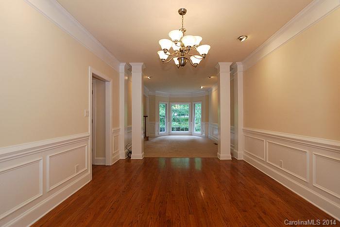 7131 Forest Ridge Road Weddington, NC 28104 - Photo 14 of 23 a view of a livingroom with wooden floor