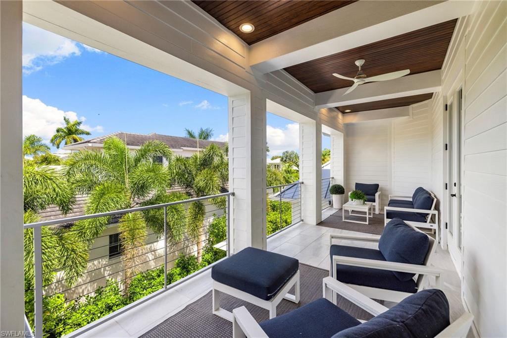 950 8th Street South Naples, FL 34102 - Photo 15 of 21 a living room with furniture and a large window