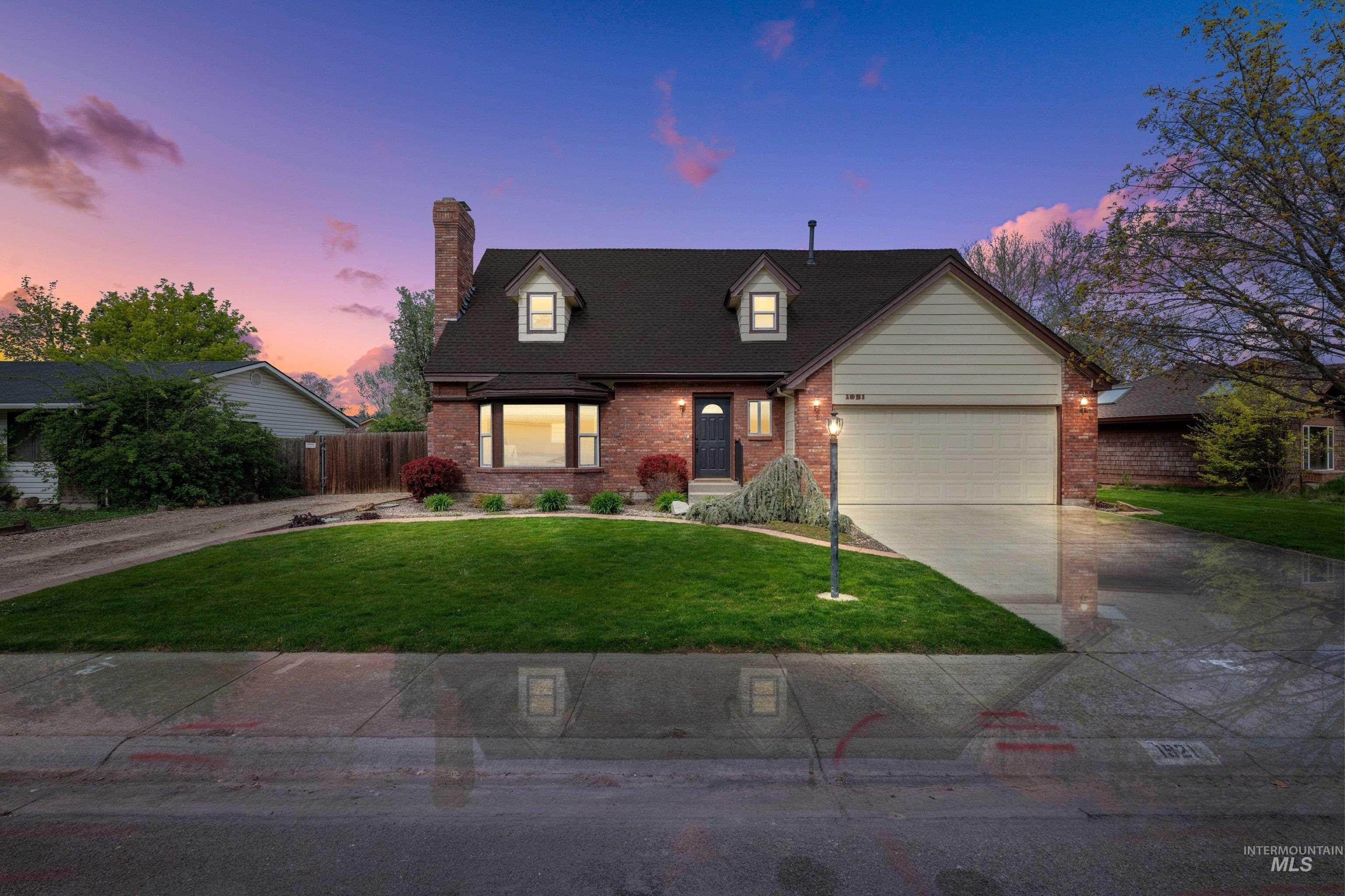 1921 Incline Way Meridian, ID 83646 - Photo 1 of 50 Brick exterior with a prominent bay window and dormer details