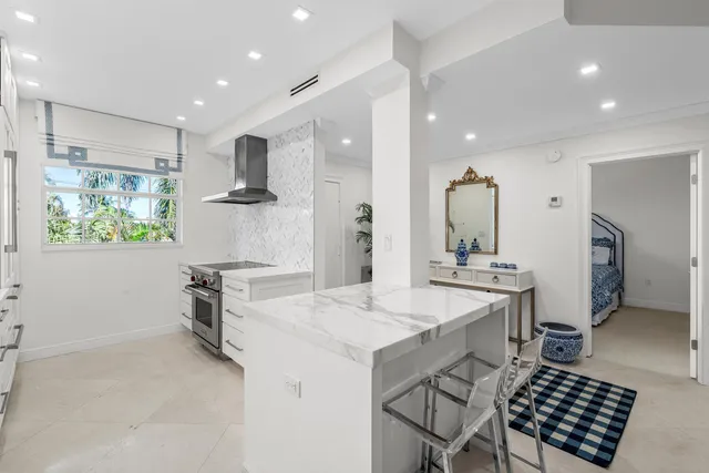 a spacious bathroom with a sink a mirror and a shower