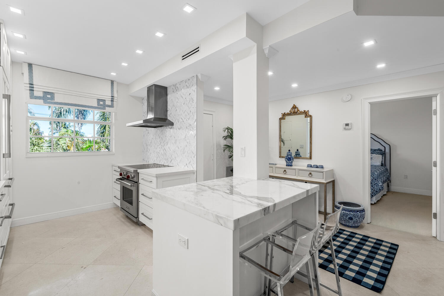 127 Peruvian Avenue, Unit 302 Palm Beach, FL 33480 - Photo 17 of 52 a kitchen with a sink appliances and cabinets