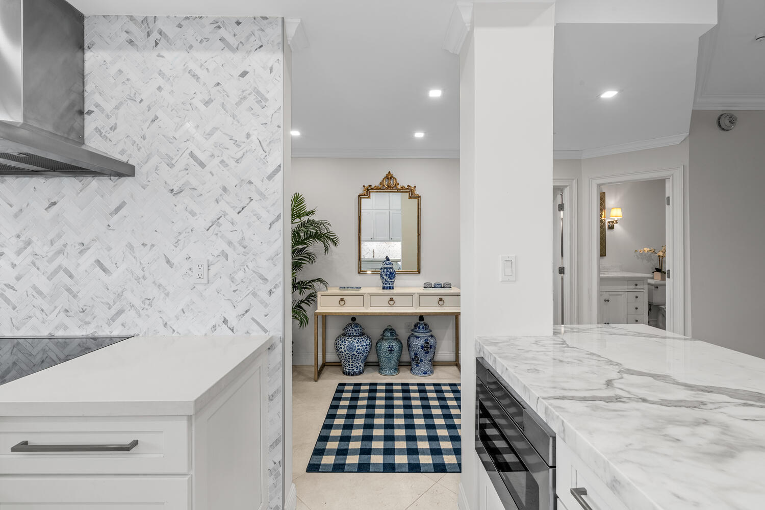 127 Peruvian Avenue, Unit 302 Palm Beach, FL 33480 - Photo 18 of 52 a spacious bathroom with a sink a mirror and a shower