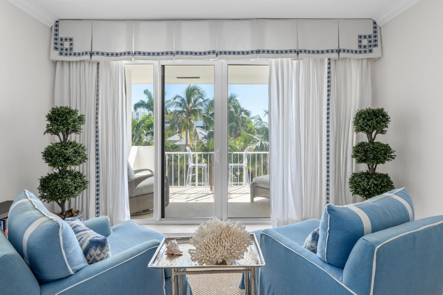 127 Peruvian Avenue, Unit 302 Palm Beach, FL 33480 - Photo 27 of 52 a living room with furniture and a large window