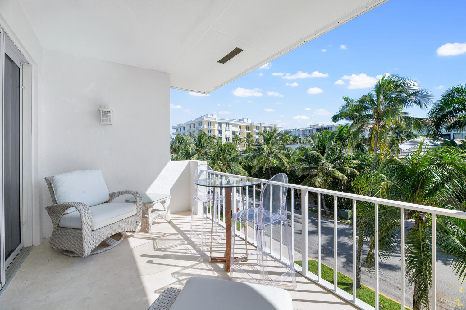 127 Peruvian Avenue, Unit 302 Palm Beach, FL 33480 - Photo 32 of 52 a view of a chairs and table in patio