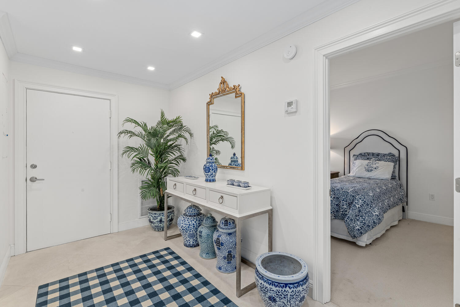 127 Peruvian Avenue, Unit 302 Palm Beach, FL 33480 - Photo 4 of 52 a living room with furniture and a potted plant