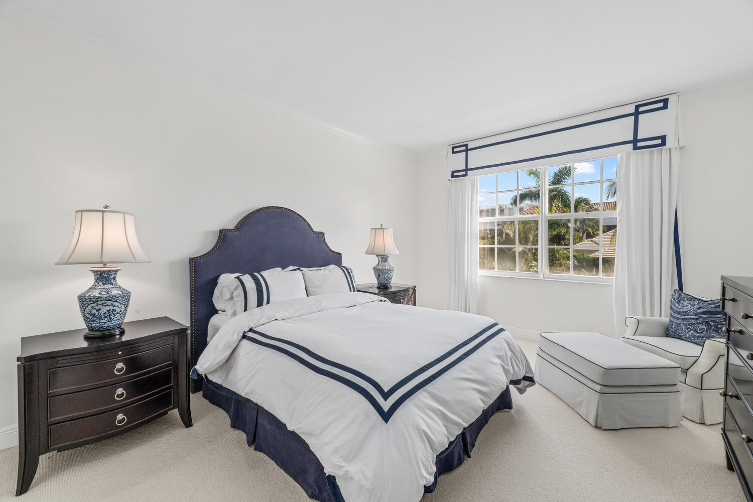 127 Peruvian Avenue, Unit 302 Palm Beach, FL 33480 - Photo 41 of 52 a bedroom with a bed and window