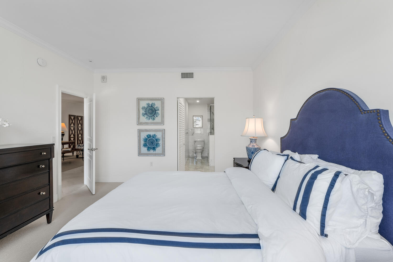 127 Peruvian Avenue, Unit 302 Palm Beach, FL 33480 - Photo 44 of 52 a bedroom with a bed and dresser