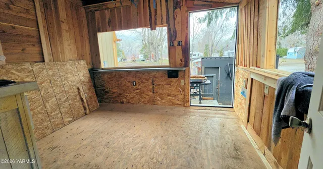 a view of livingroom with furniture and staircase