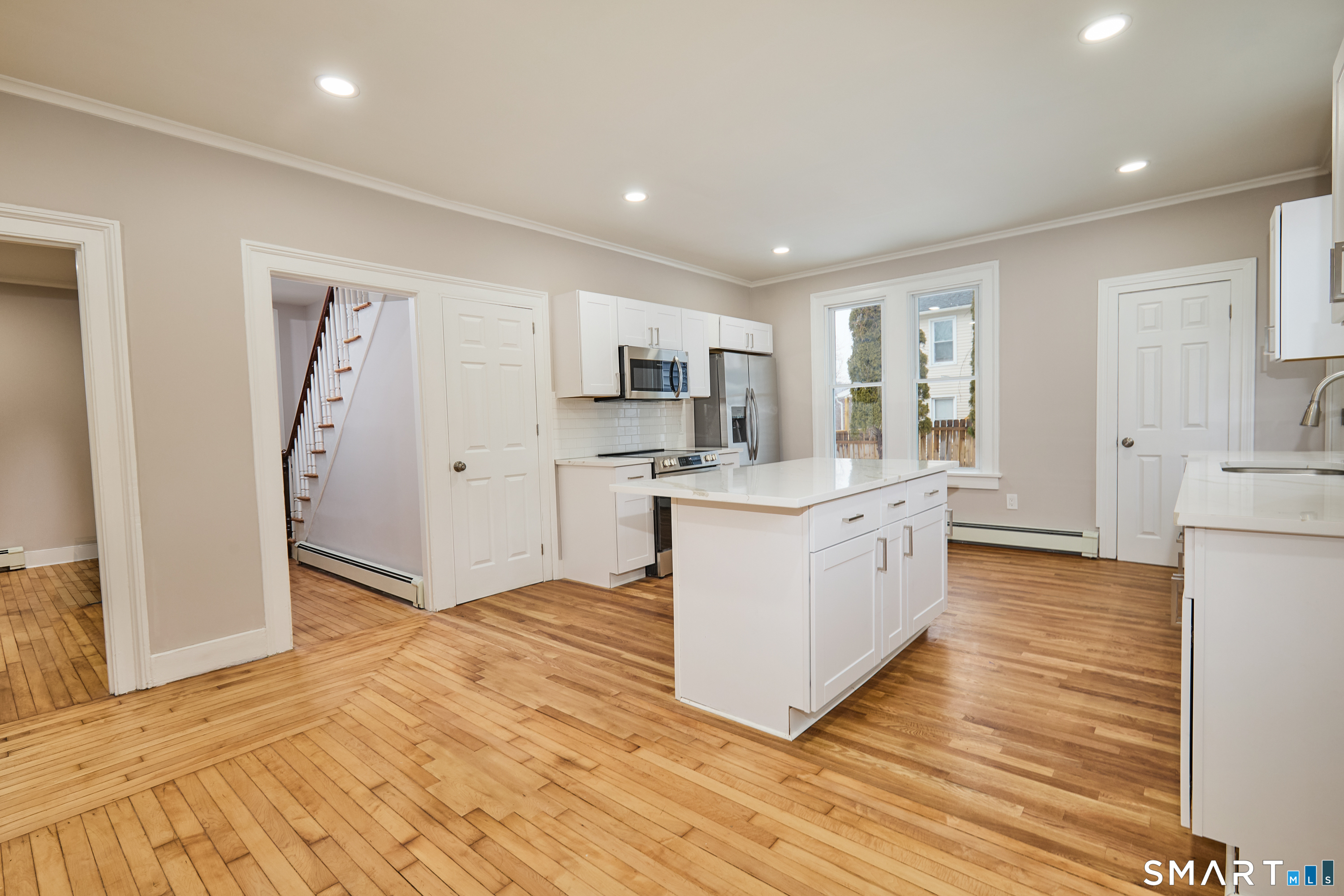 17 Grand Street Seymour, CT 06483 - Photo 12 of 40 a large kitchen with a sink stainless steel appliances and cabinets