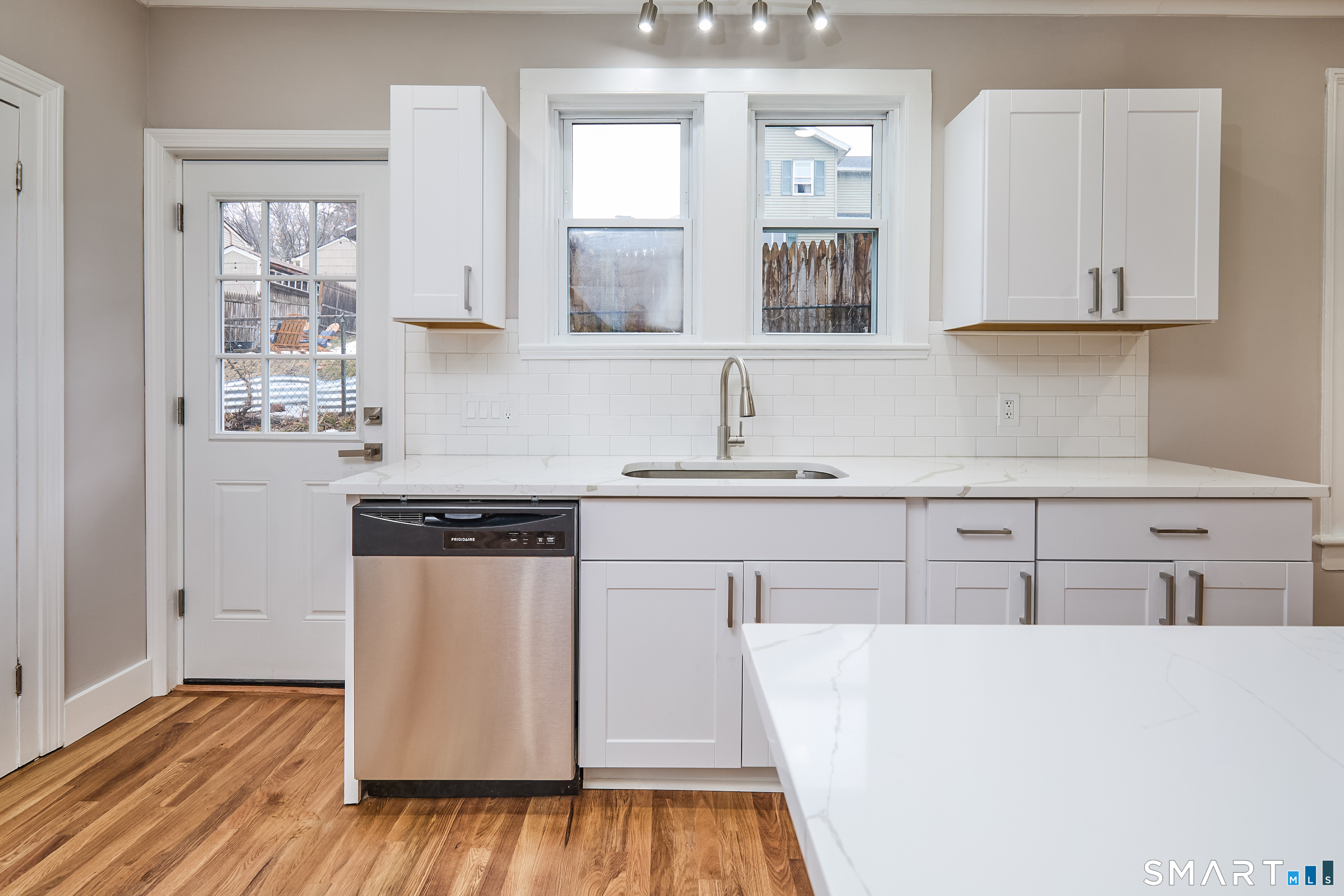 17 Grand Street Seymour, CT 06483 - Photo 16 of 40 a kitchen with kitchen island a white counter top space and cabinets