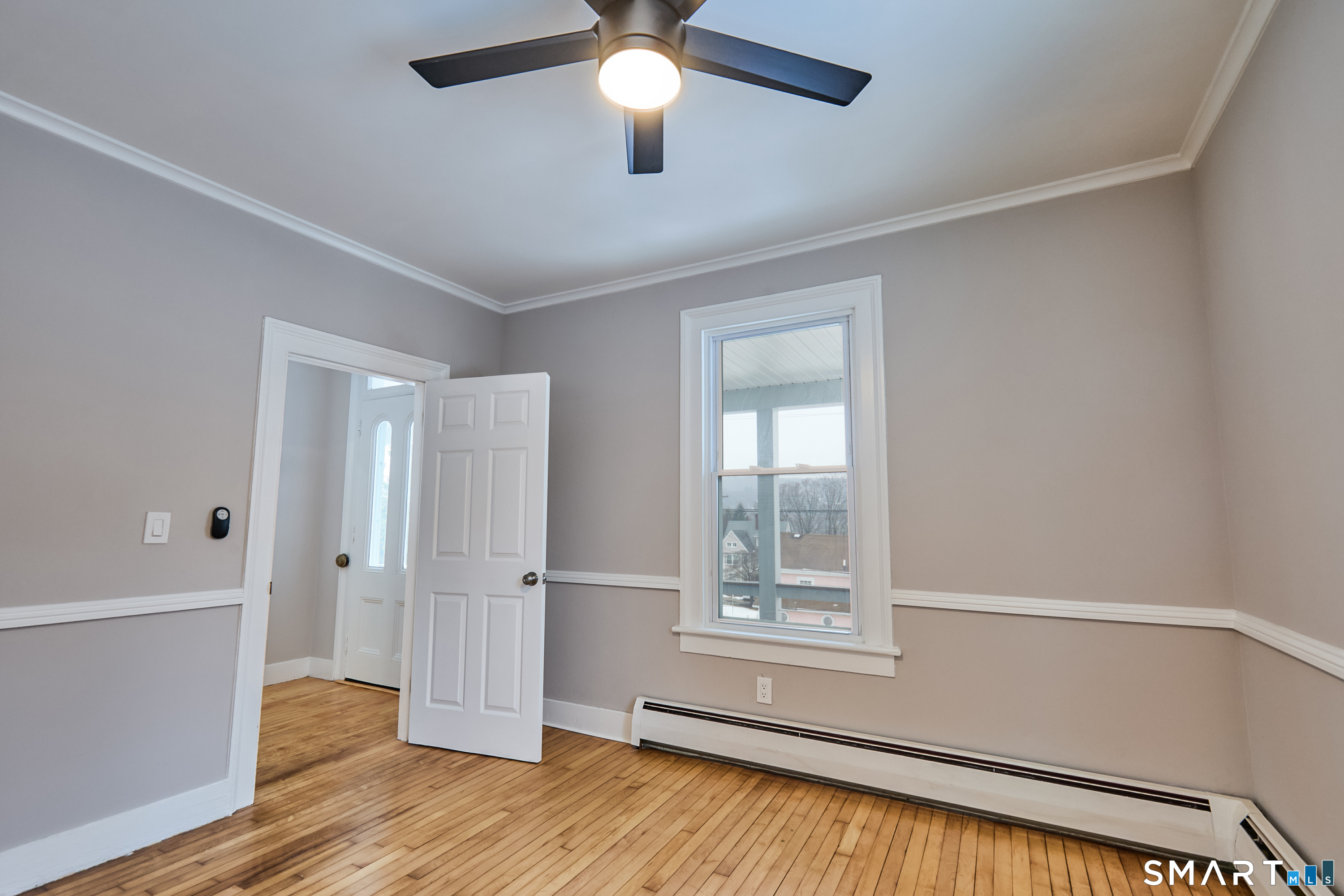 17 Grand Street Seymour, CT 06483 - Photo 28 of 40 wooden floor in an empty room with a window