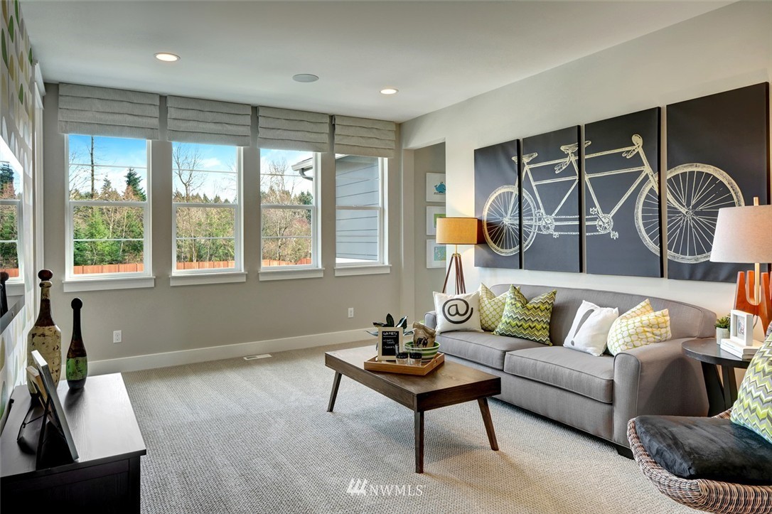 5027 Southeast 3rd Place Renton, WA 98059 - Photo 5 of 9 a living room with furniture and a window