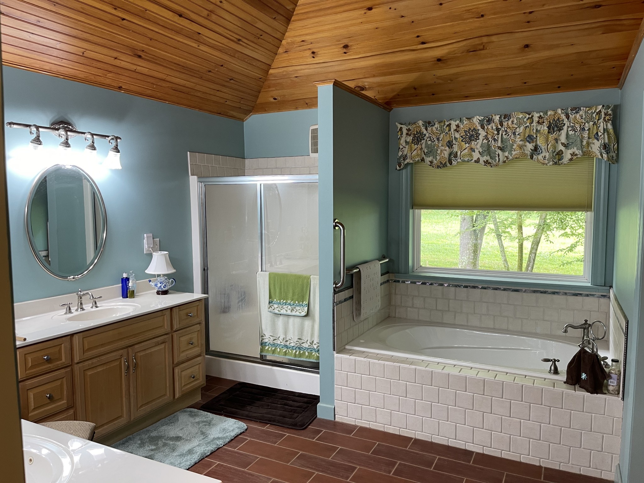 2058 Bodenham Road Pulaski, TN 38478 - Photo 13 of 38 a bathroom with a tub sink and mirror