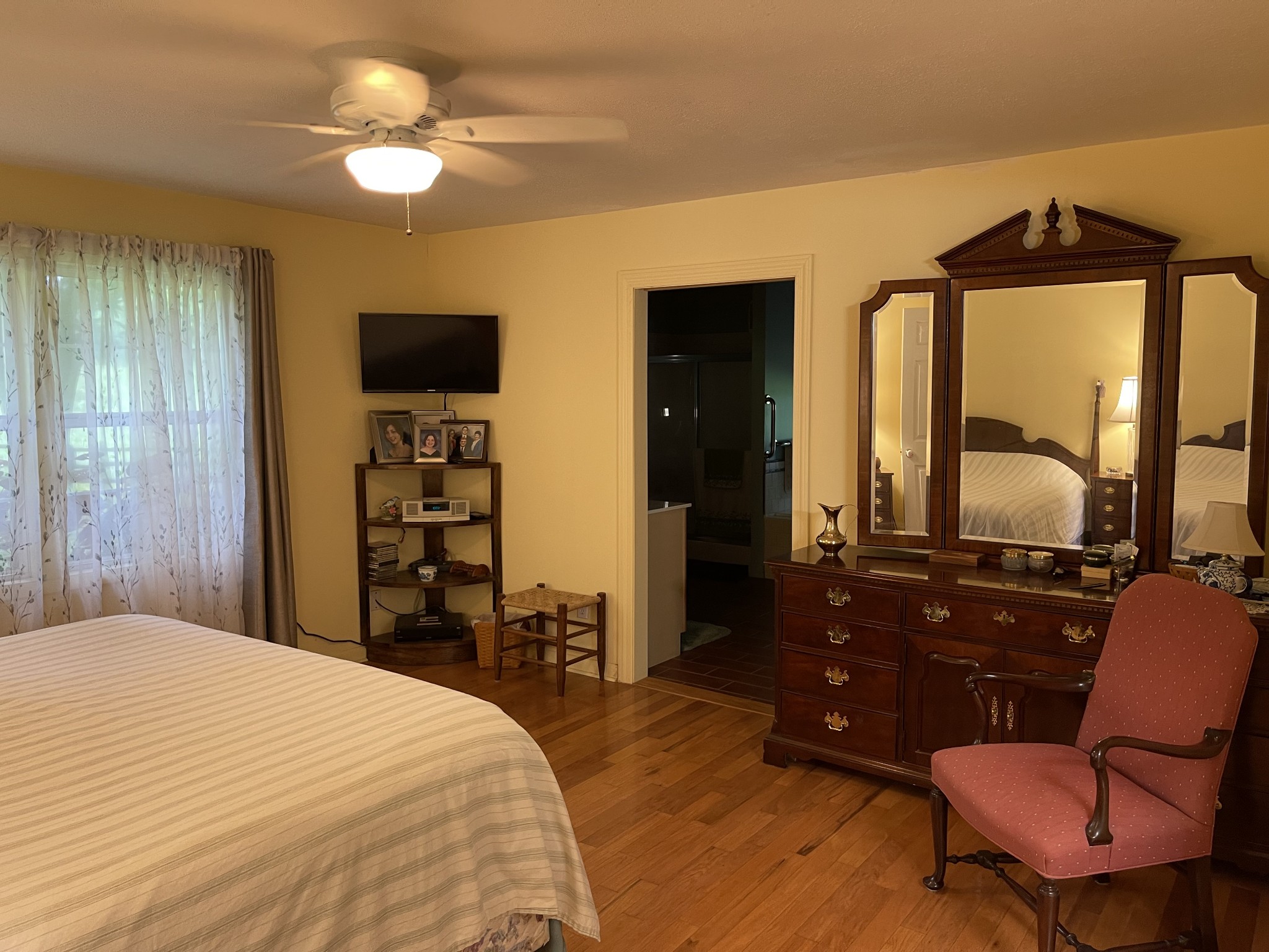 2058 Bodenham Road Pulaski, TN 38478 - Photo 19 of 38 a bedroom with a bed window and a chair