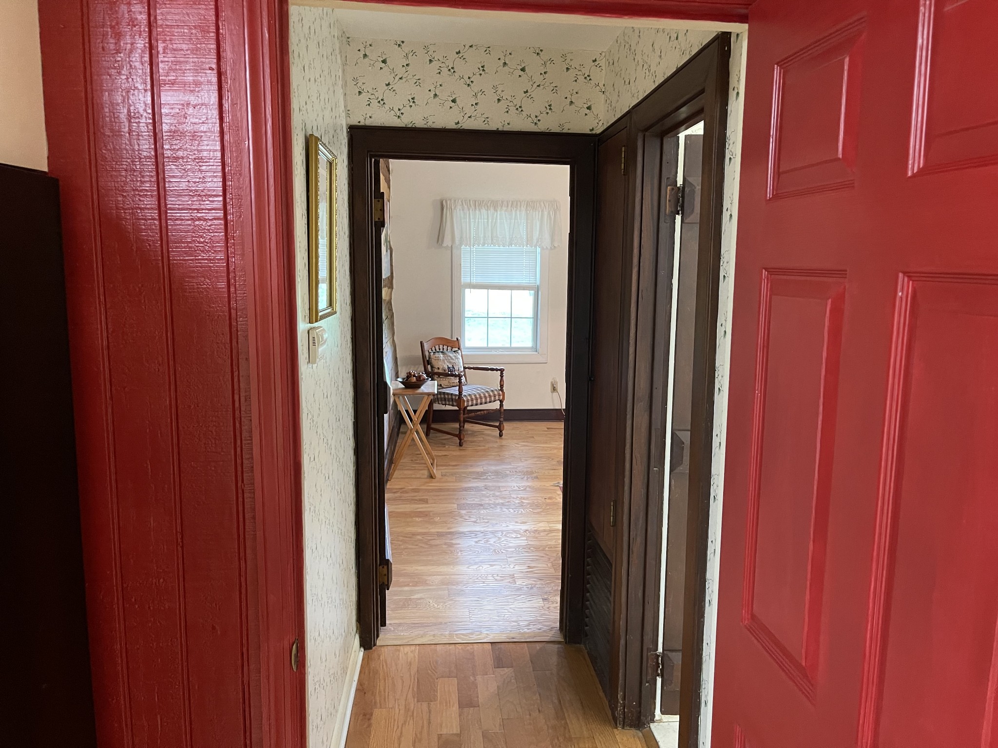2058 Bodenham Road Pulaski, TN 38478 - Photo 20 of 38 a hallway with a view of living room and a livingroom with furniture