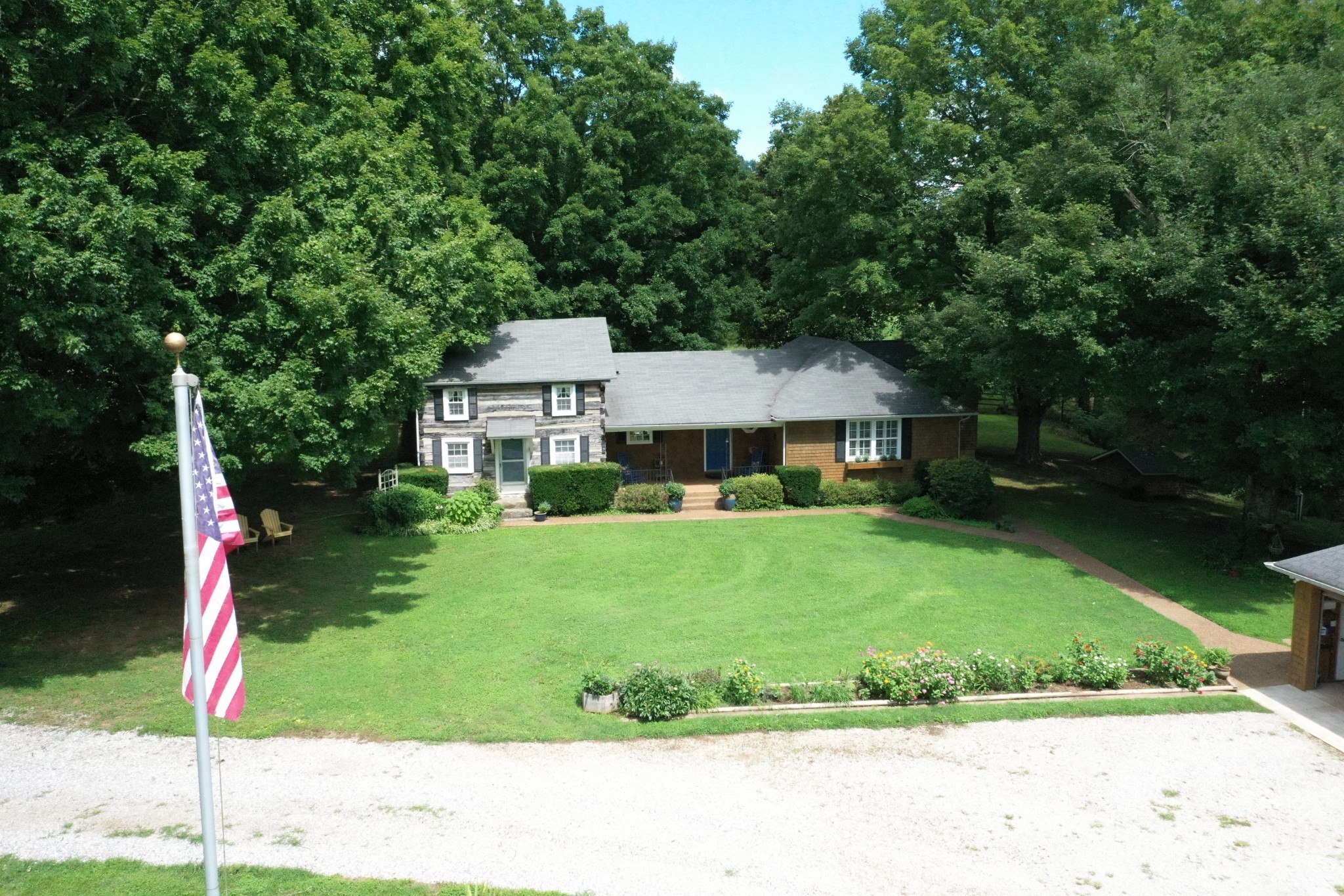 2058 Bodenham Road Pulaski, TN 38478 - Photo 3 of 38 a front view of a house with a yard