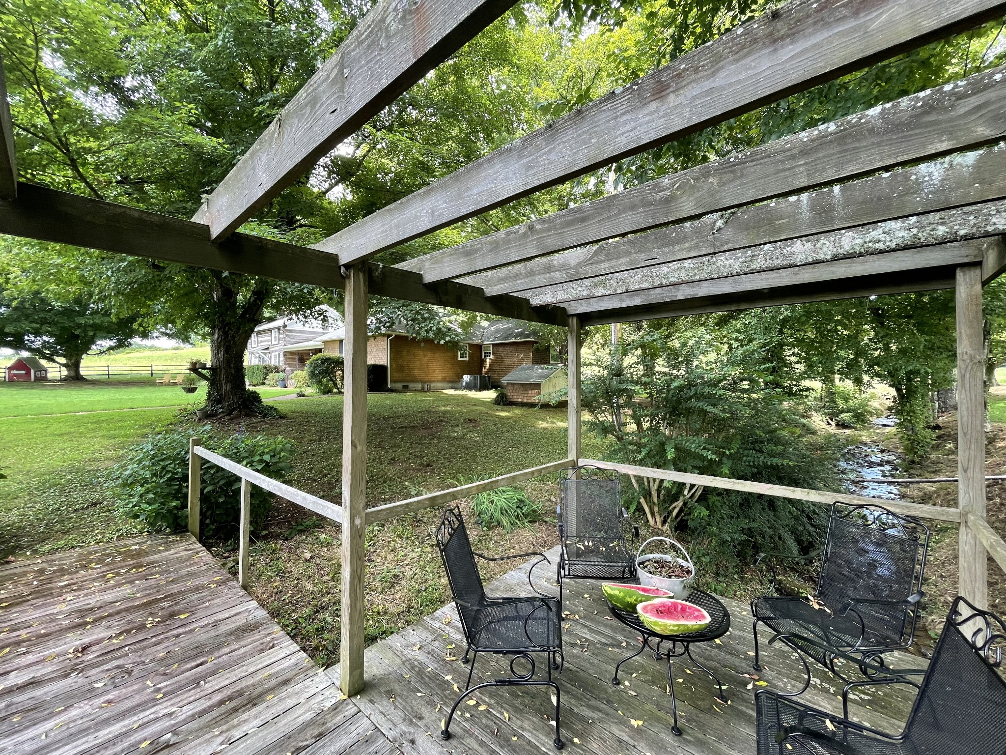 2058 Bodenham Road Pulaski, TN 38478 - Photo 37 of 38 a view of deck with furniture and garden