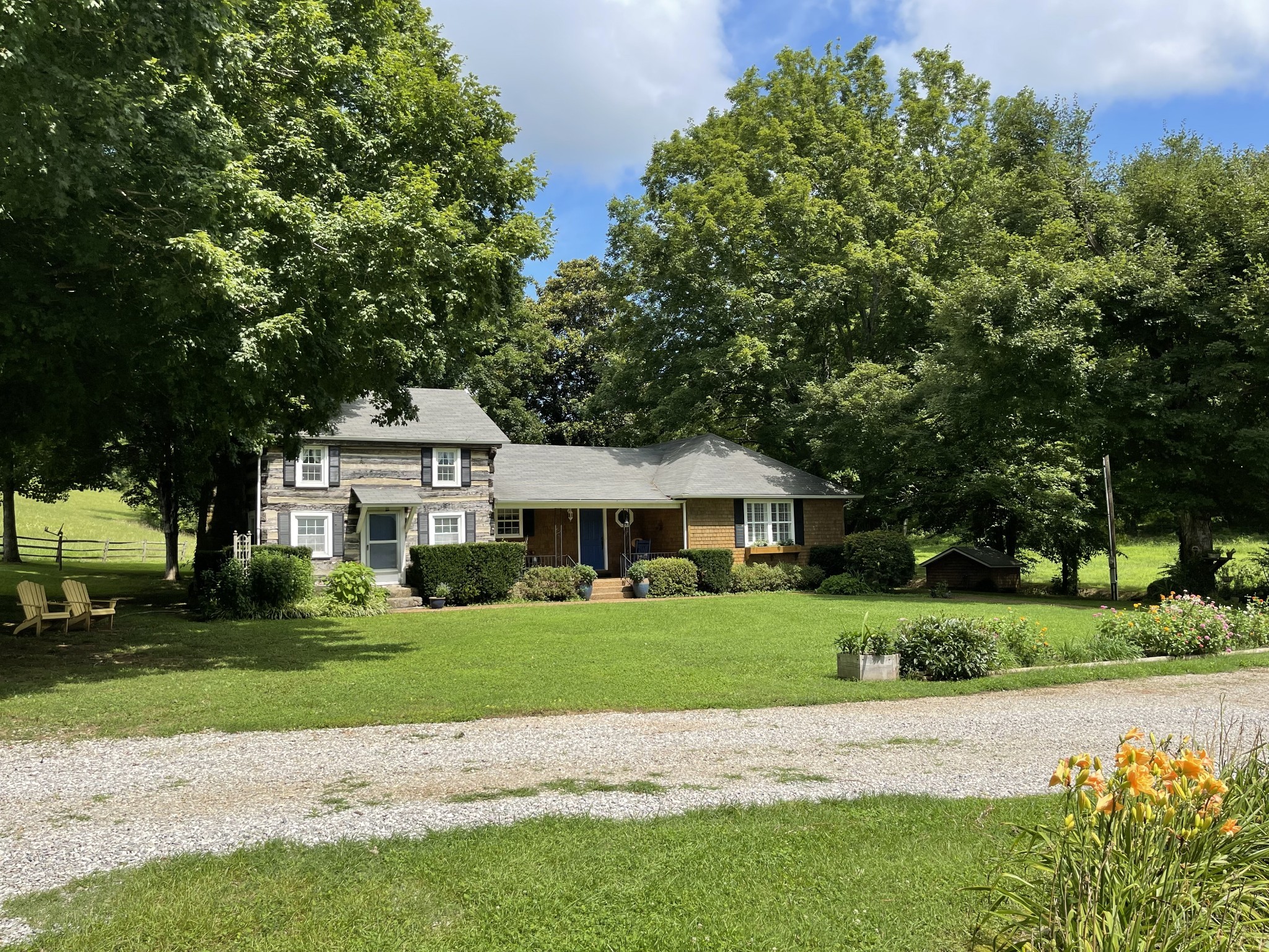 2058 Bodenham Road Pulaski, TN 38478 - Photo 6 of 38 a front view of a house with a yard and garage