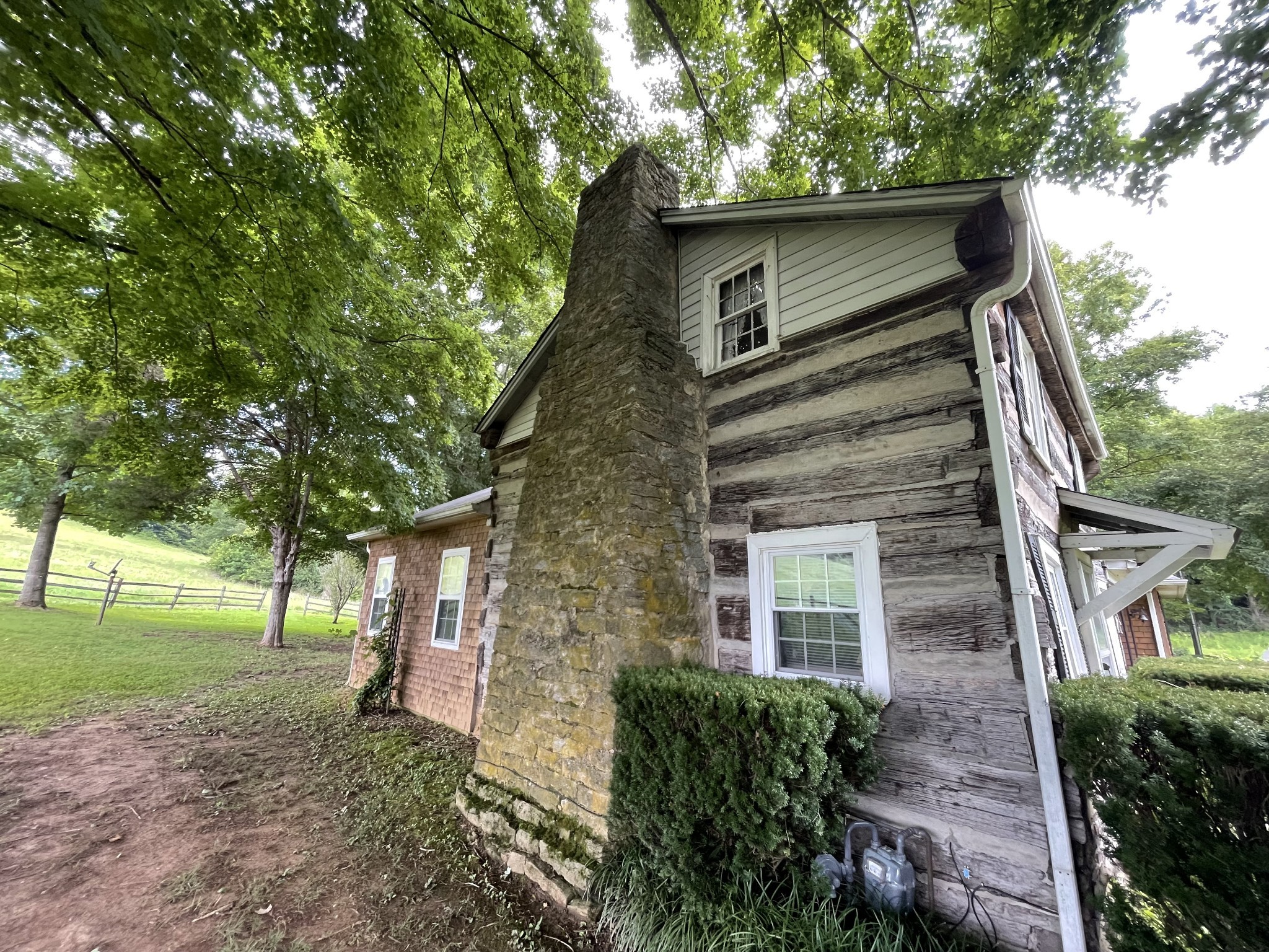 2058 Bodenham Road Pulaski, TN 38478 - Photo 7 of 38 a front view of a house with a yard